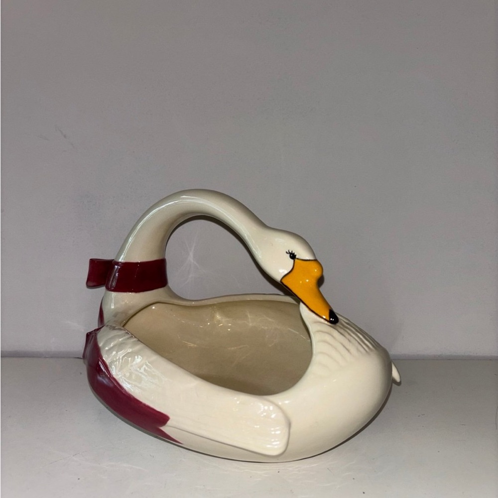 ceramic goose display bowl with red bow and arched neck